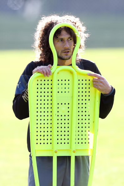 WELLINGTON, NEW ZEALAND - JULY 24: Fabricio Coloccini of Newcastle United looks through a training dummy during a Newcastle United training session at Newtown Park on July 24, 2014 in Wellington, New Zealand. (Photo by Hagen Hopkins/Getty Images)