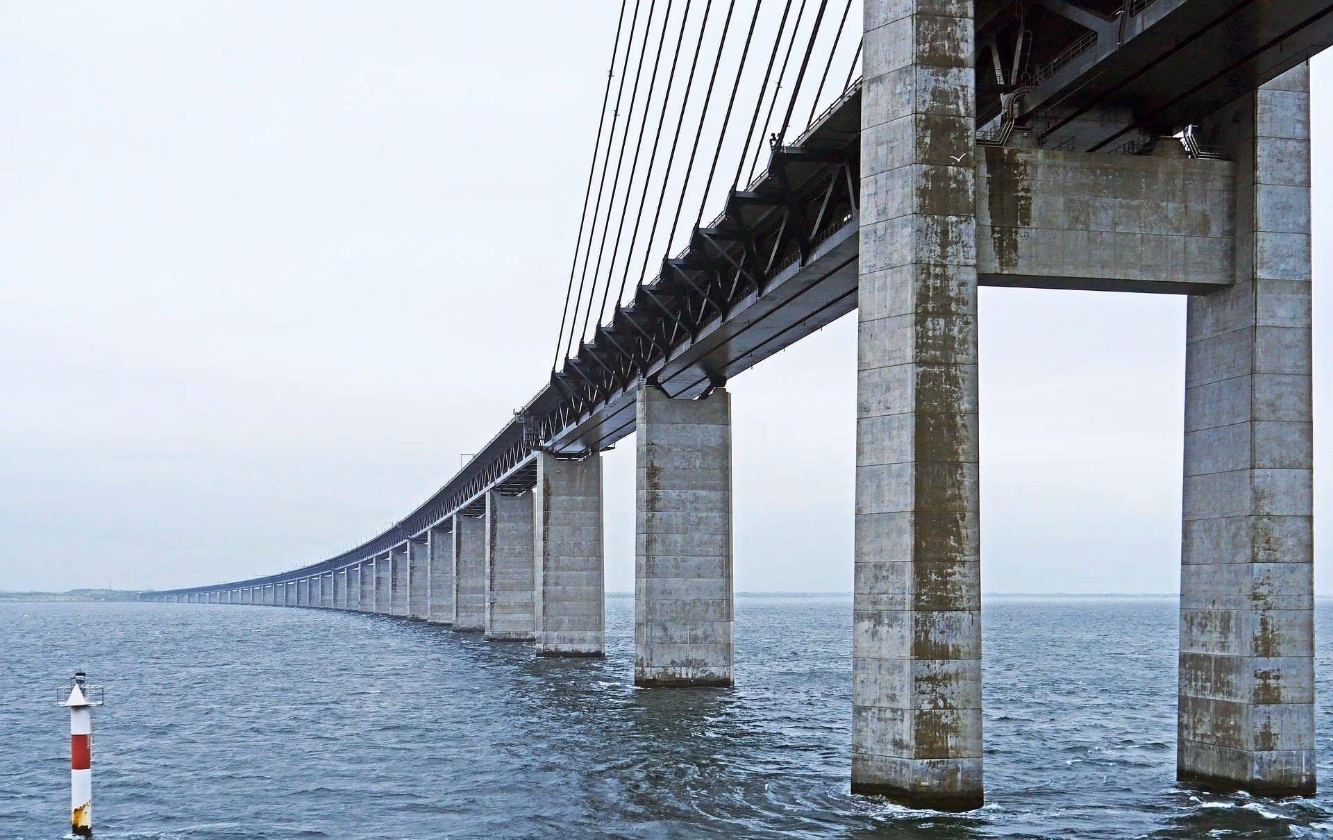 The Øresund Bridge spans the Øresund, a strait between Denmark and Sweden, and the narrowest point between the North Sea and Baltic Sea / Baltic Sea.