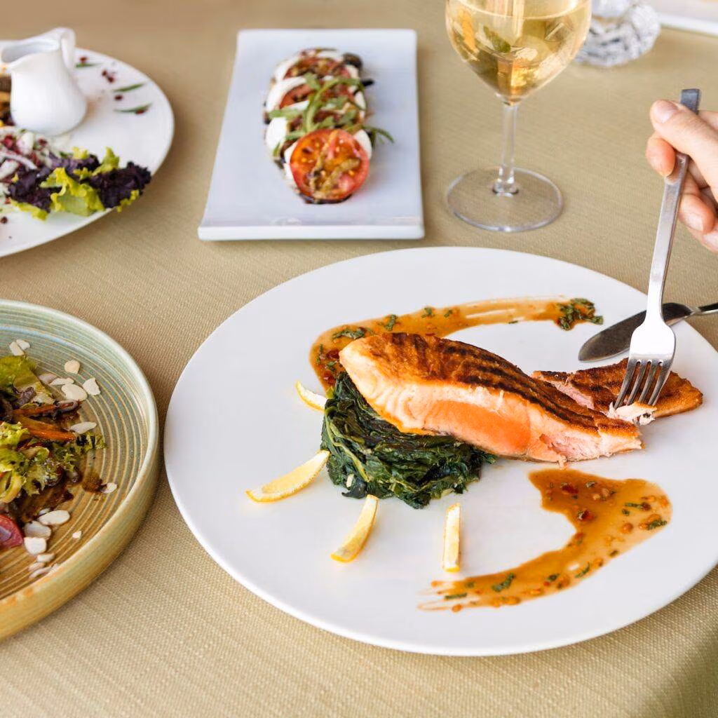 cooked fish on white ceramic plate