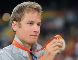 Alex Schwazer of Italy poses on the podi