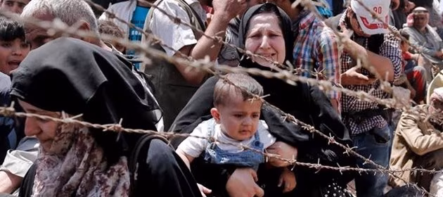 profughi-e-filo-spinato immigrati