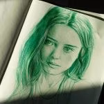 Tristezza-penna verde su carta