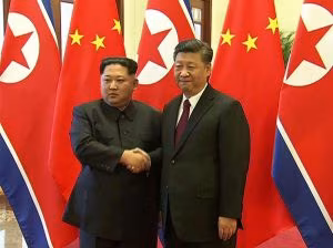 kim-Jon-un-e Xi Jinping