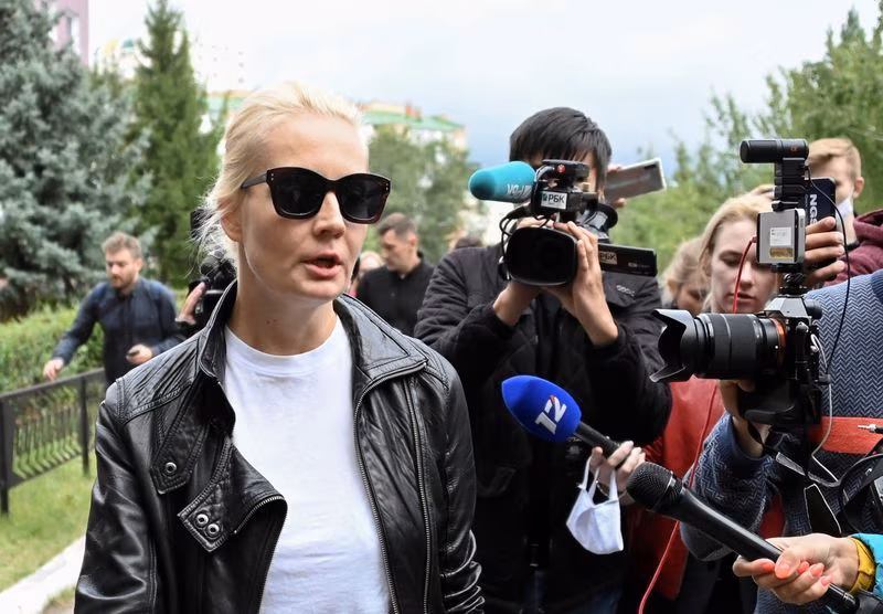Yulia Navalnaya, wife of Russian opposition leader Alexei Navalny, speaks with the media outside a hospital in Omsk