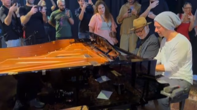 Ludovico Einaudi con Chris Martin