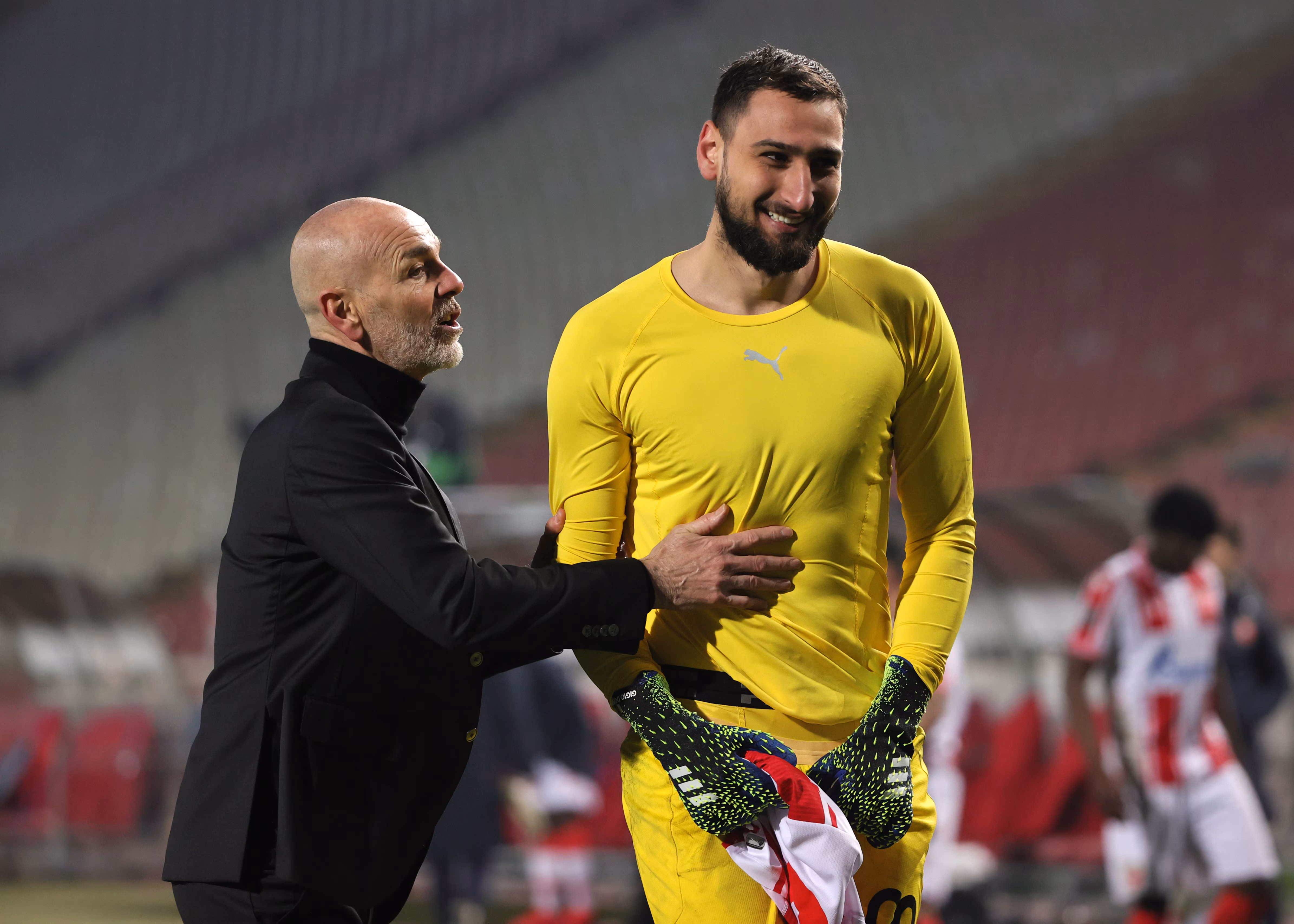 Stefano Pioli e Gigio Donnarumma