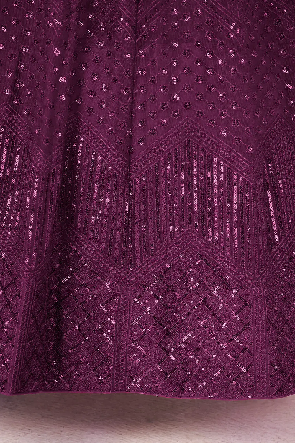 Soft net fabric texture close up of this purple lehenga for wedding ensemble