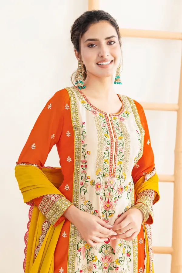 Close up of handmade dabka dori and mirror embroidery on chinon kurta