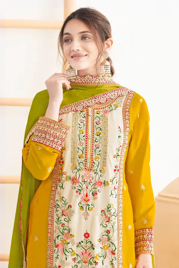 Hand stitched mirrors and dabka dori work on green chinon kurta