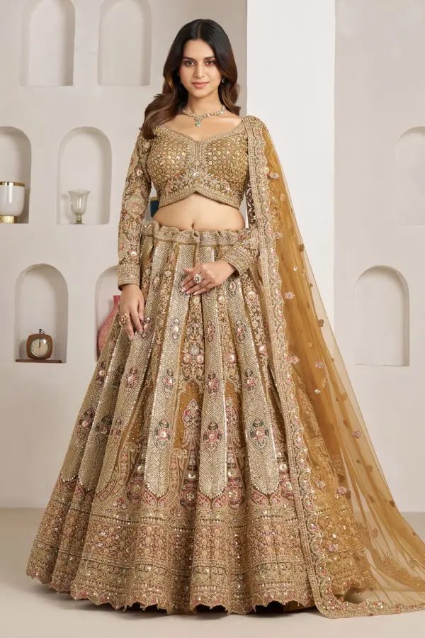 Gold bridal lehenga choli in antique gold with heavy embroidery by Khaish