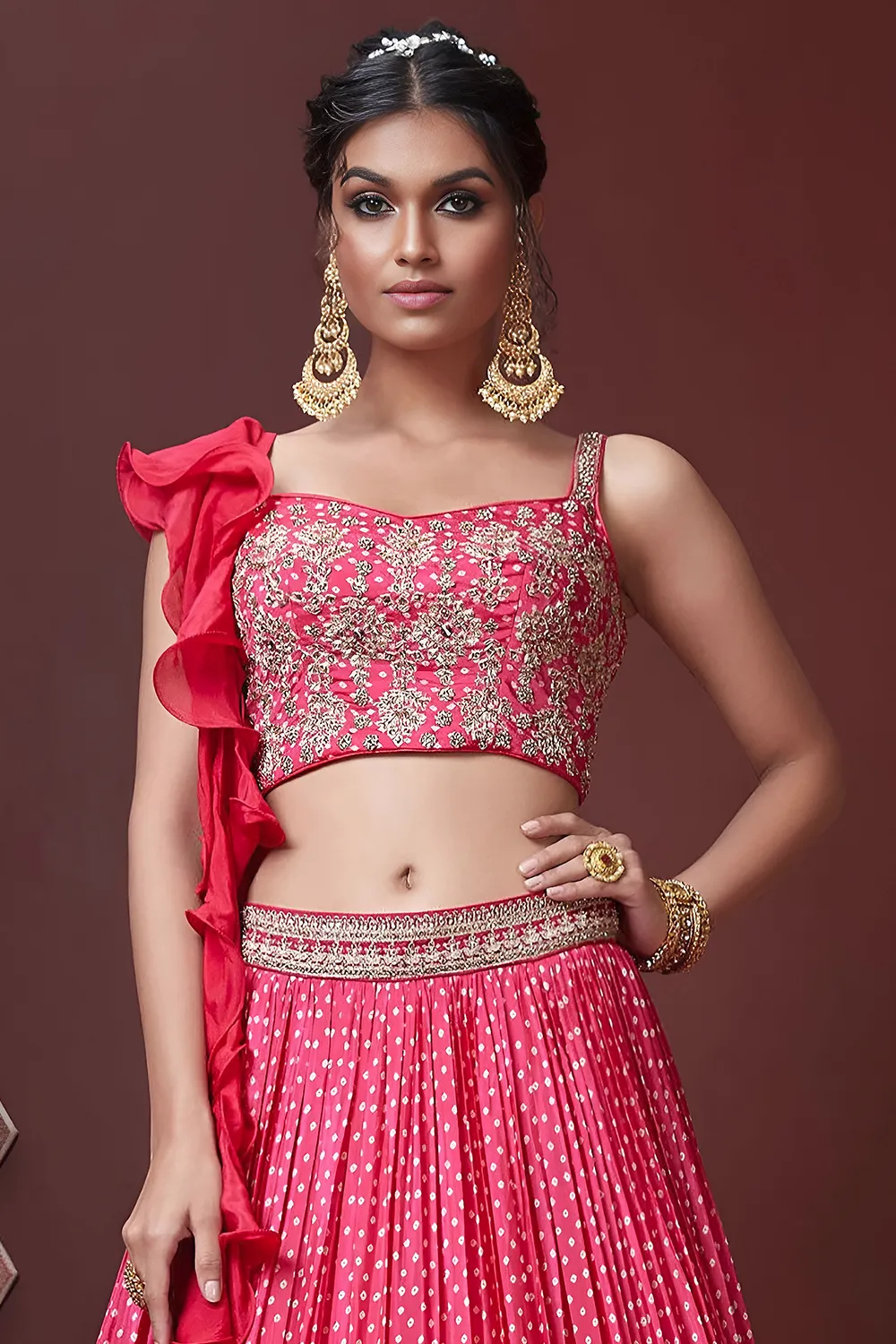 Swarovski crystals and heavy embroidery detail on pink silk lehenga
