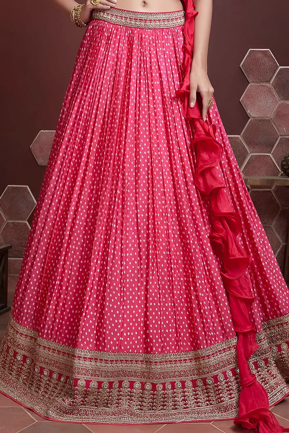Pink silk lehenga hem with Swarovski and digital print detailing