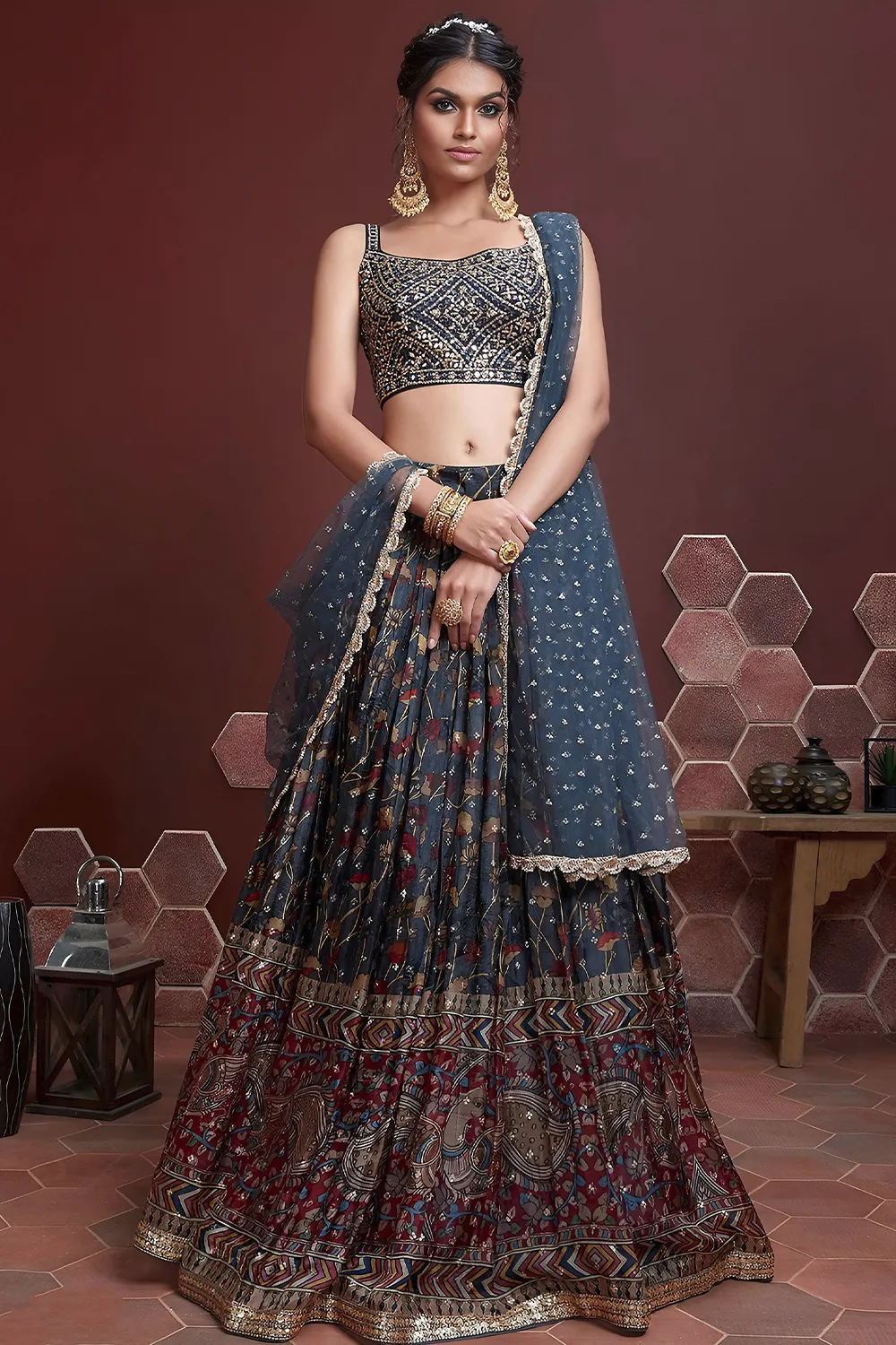 Blue silk lehenga with Swarovski, digital print and heavy embroidery by Khaish
