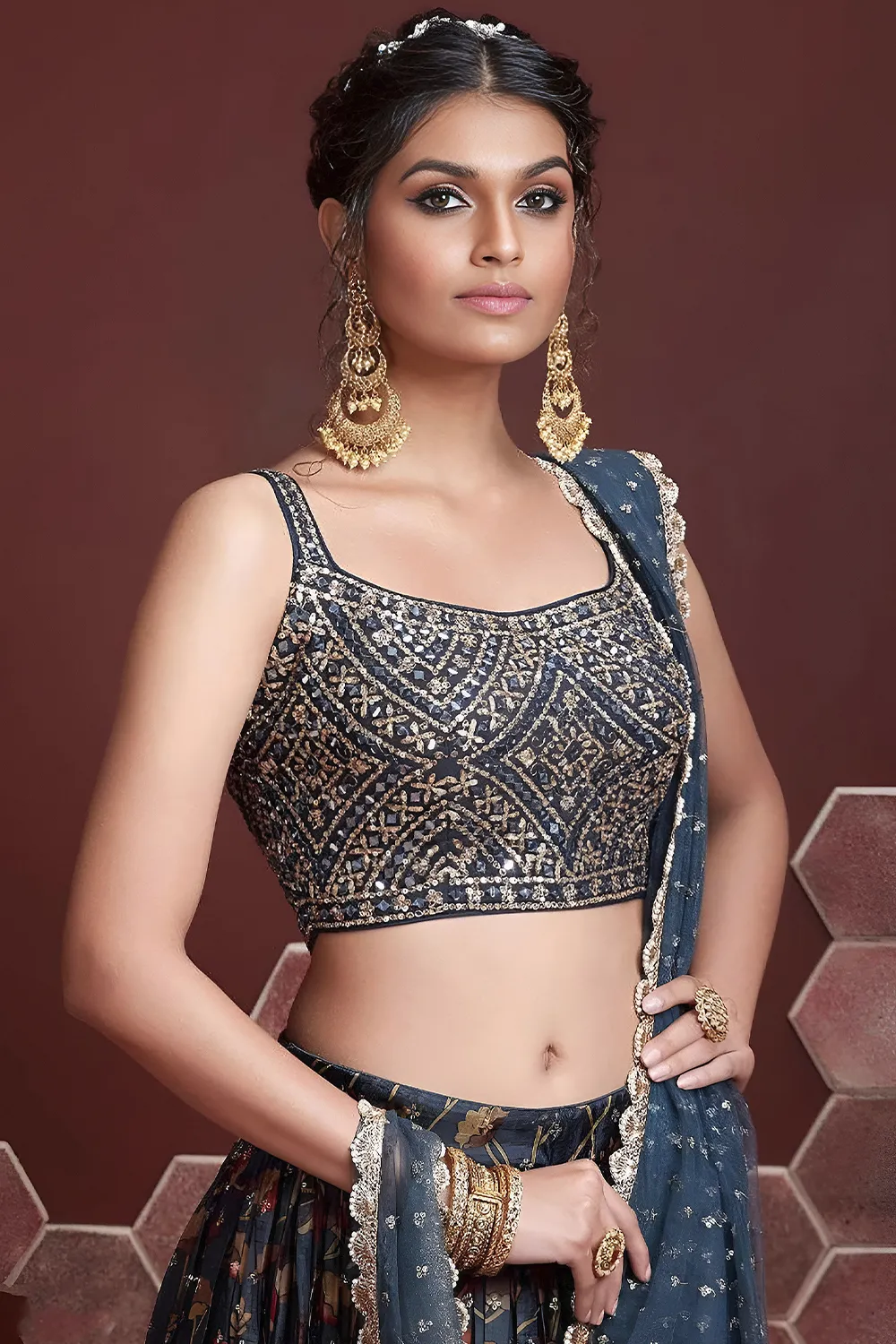 Swarovski crystals and heavy embroidery detail on blue silk lehenga