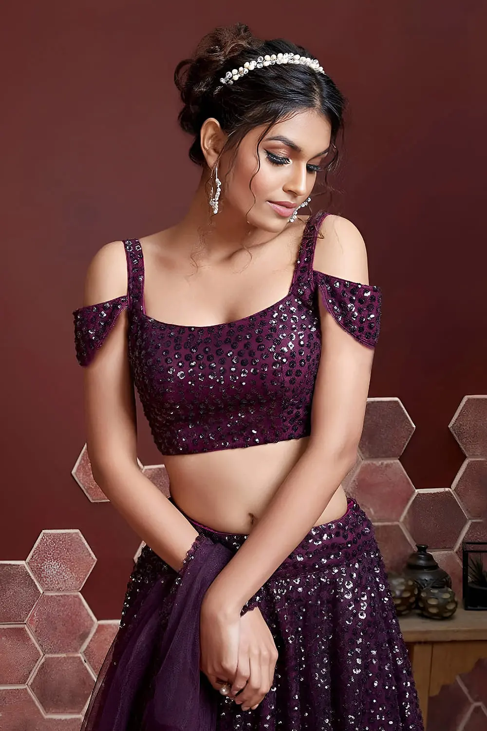 Digital print and embroidery work close up on purple silk lehenga