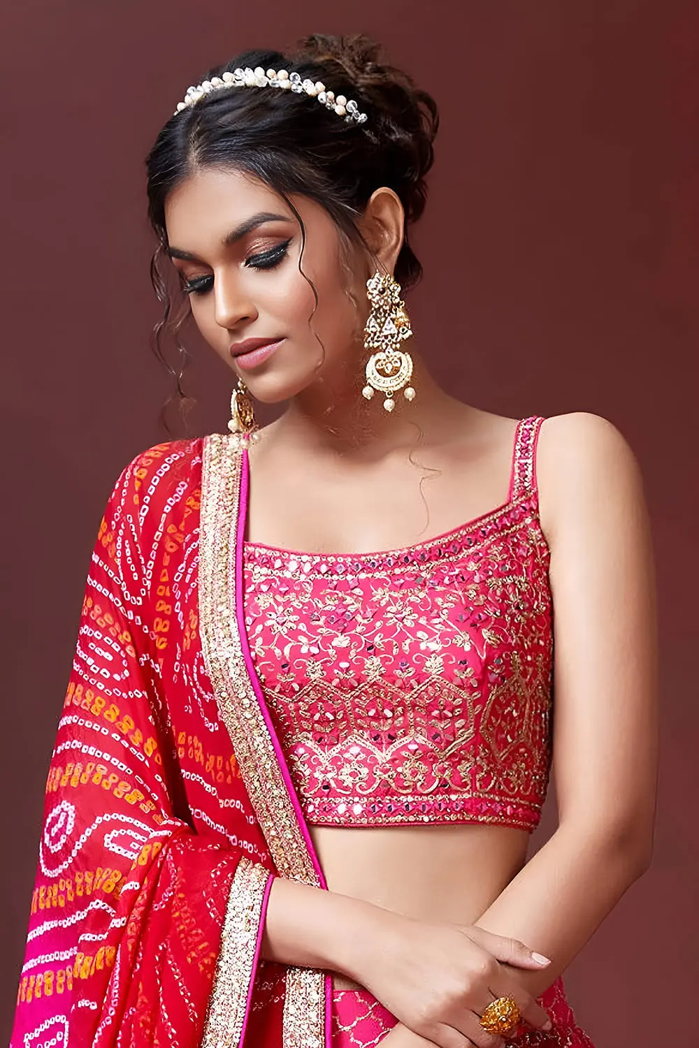 Swarovski crystals and heavy embroidery detail on pink wedding lehenga