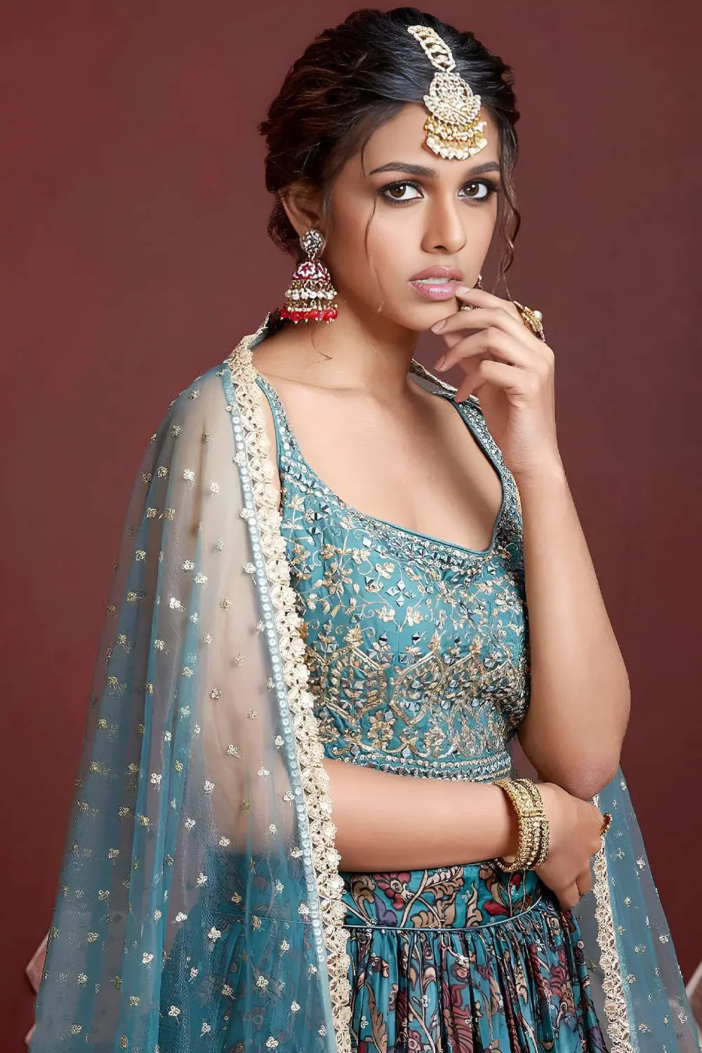 Swarovski crystals and heavy embroidery detail on sky blue silk lehenga