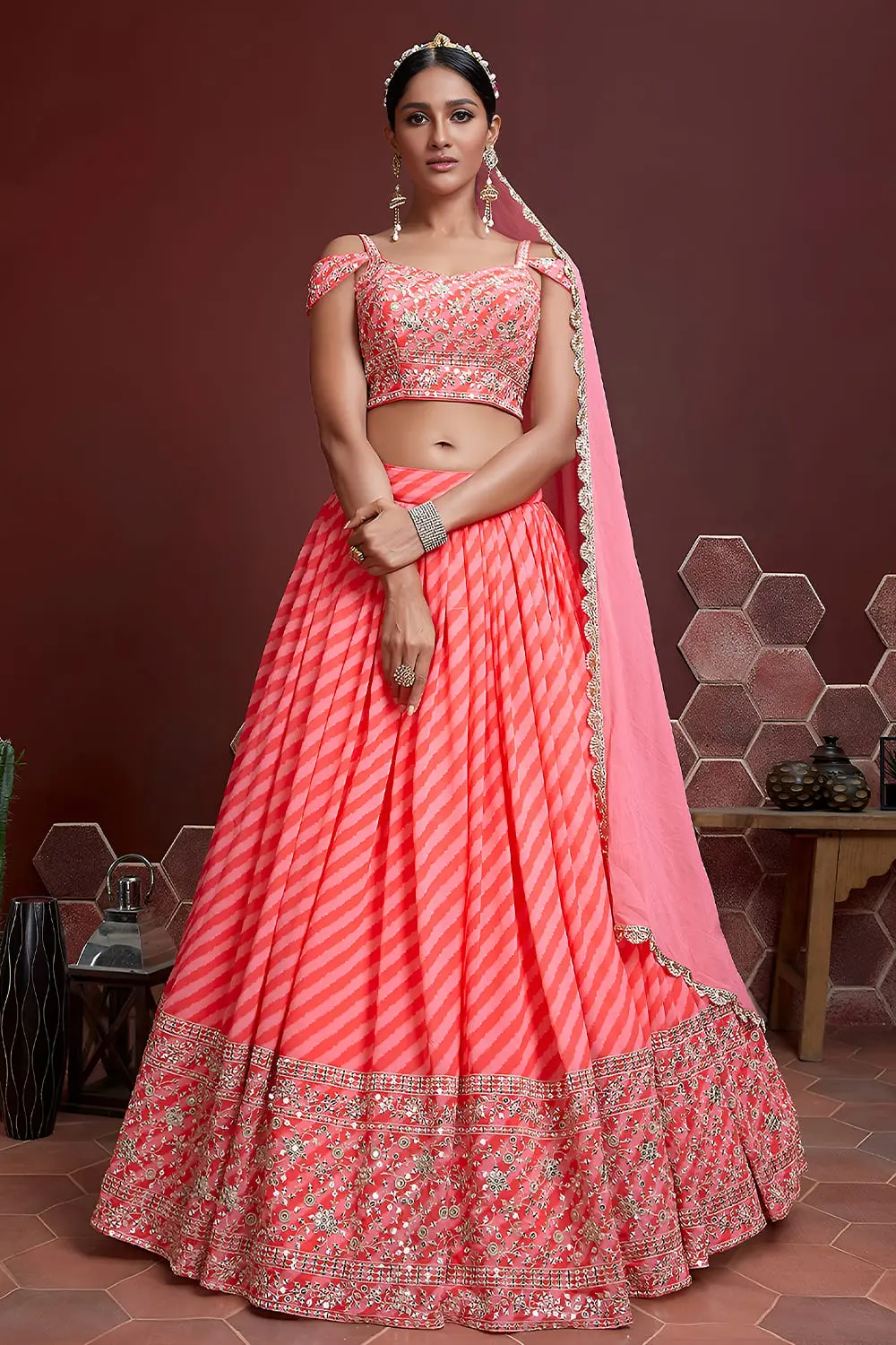 Peach silk lehenga with Swarovski, digital print and heavy embroidery by Khaish
