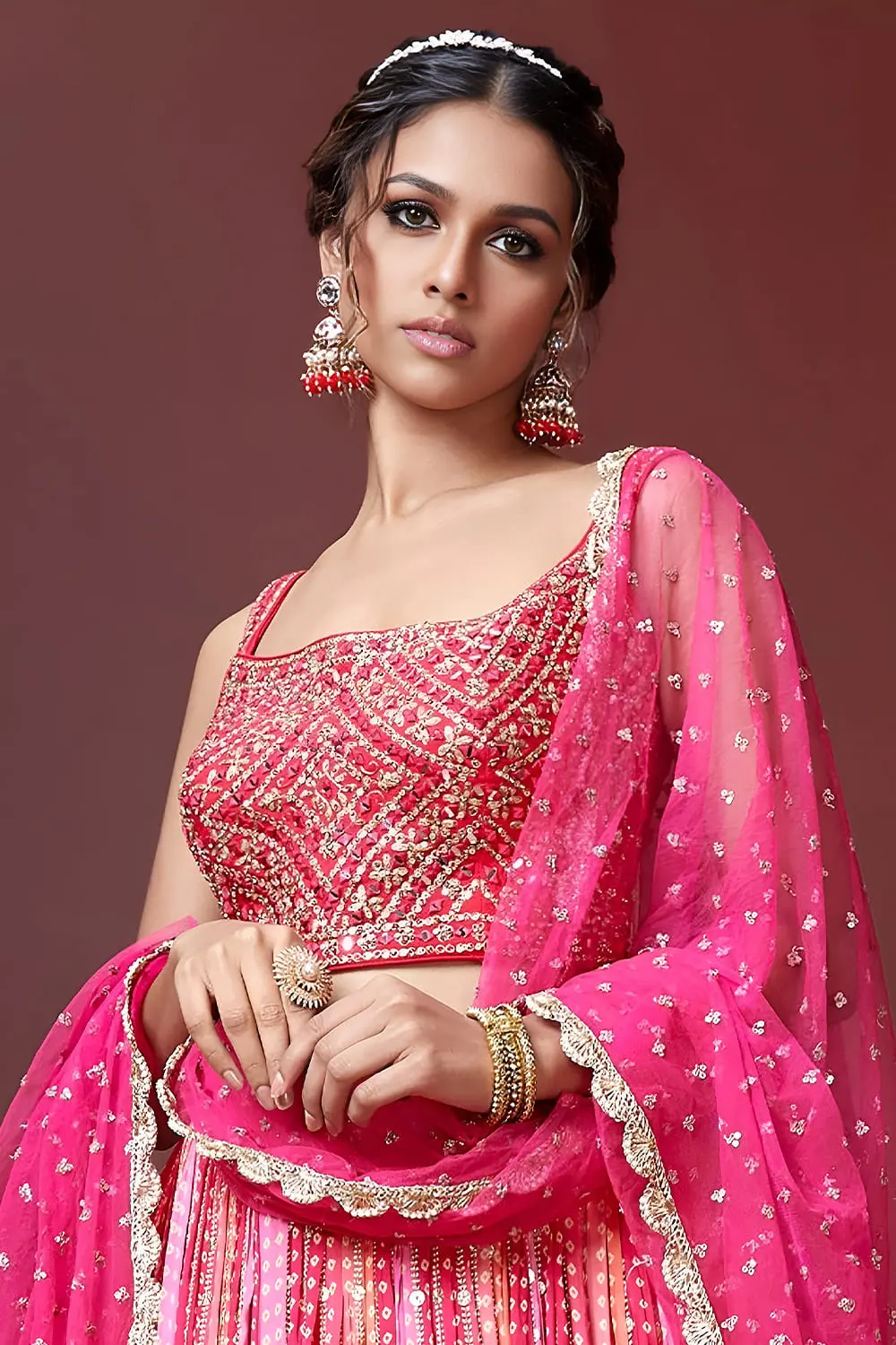 Swarovski crystal and heavy embroidery detail on pink reception lehenga