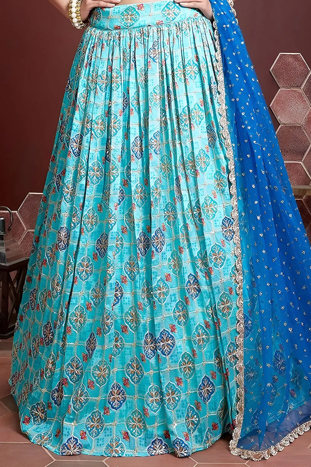 Sky blue silk lehenga hem with Swarovski crystals and digital print