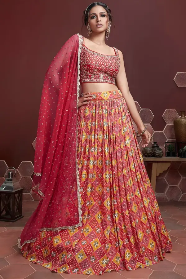 Red silk lehenga with Swarovski, digital print and heavy embroidery by Khaish