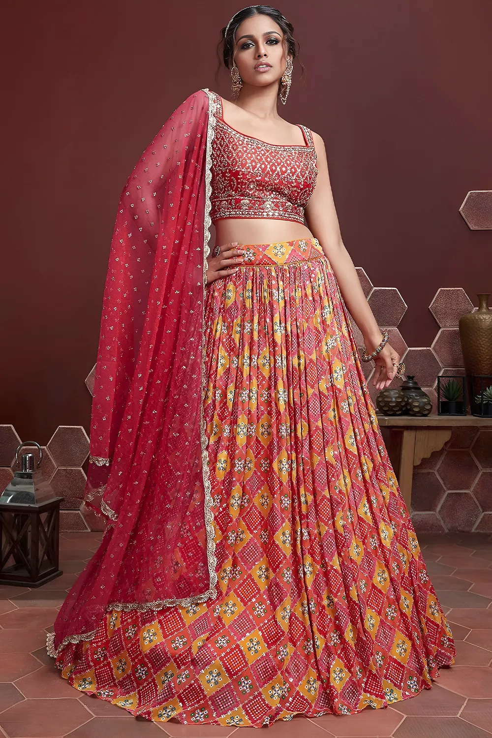 Red silk lehenga with Swarovski, digital print and heavy embroidery by Khaish