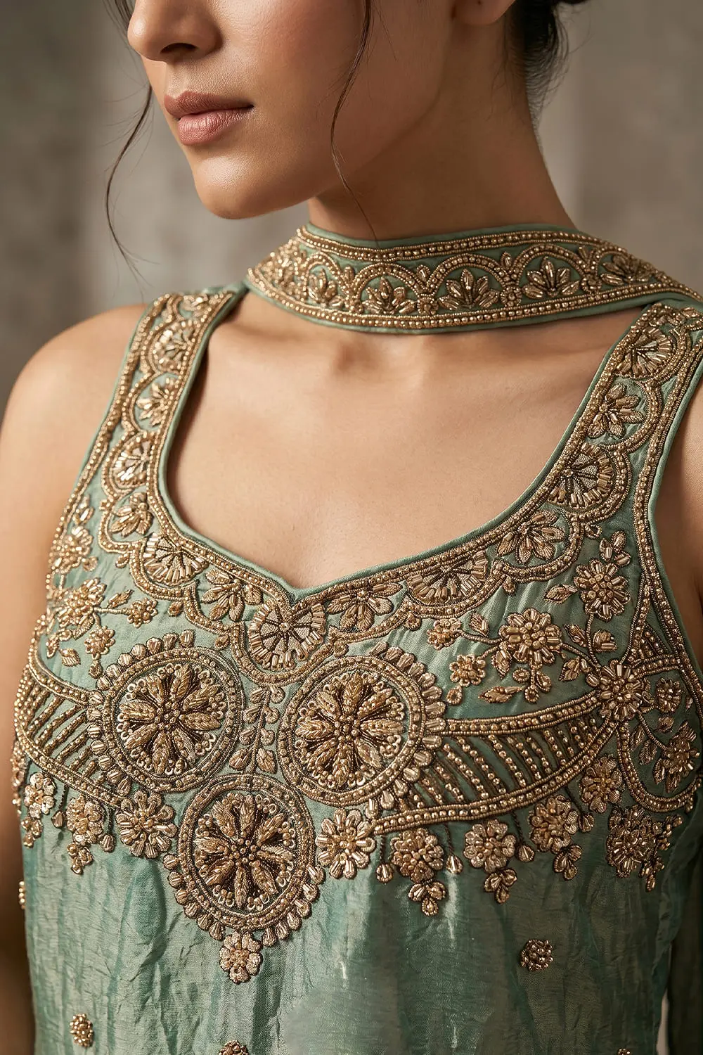 Close up of handwork and embroidery on mint green tora silk kurta