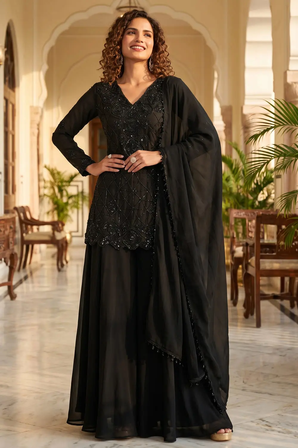 Black chinon kurta palazzo set with tassel-border dupatta full view