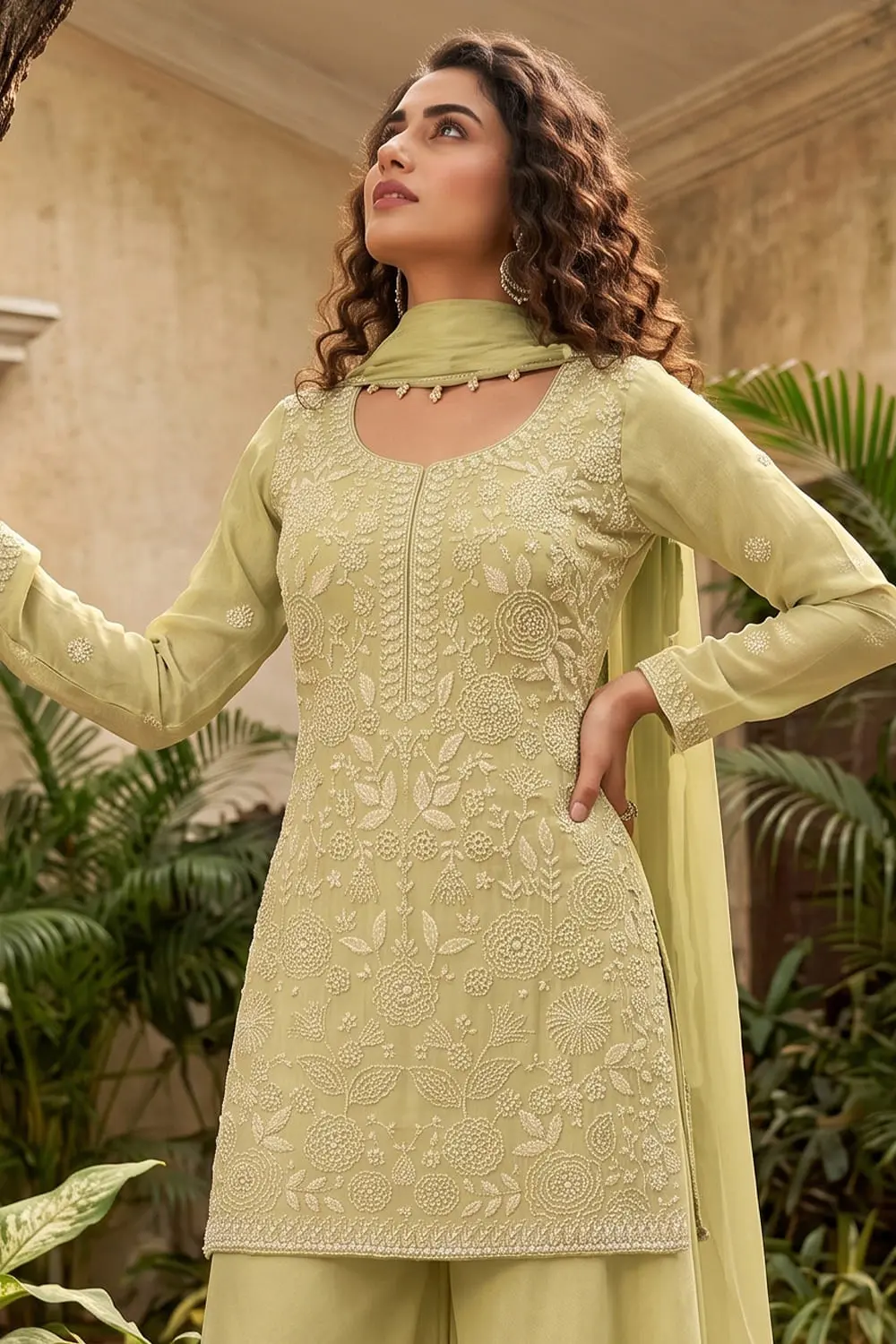Close up of beads work on pistachio green chinon kurta palazzo set