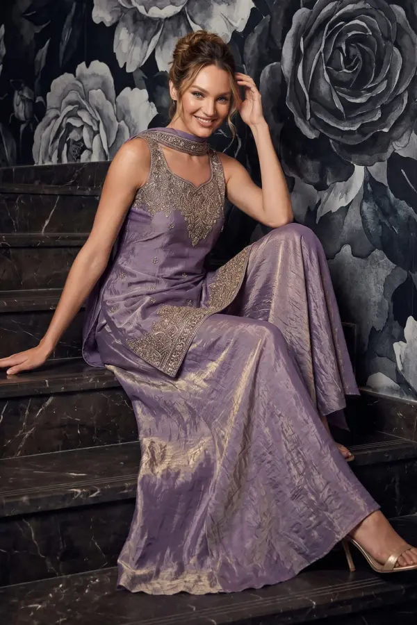 Purple tora silk kurta palazzo set with dupatta seated view