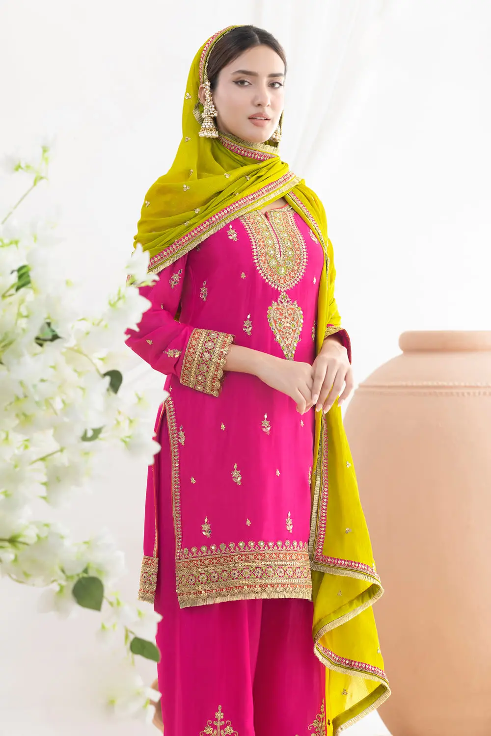 Dabka dori and sequins sleeve embroidery on deep pink chinon kurti