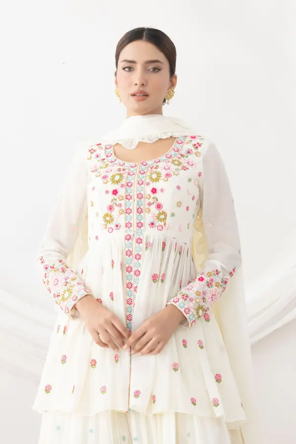White georgette kurta lehenga styled with four side frill dupatta