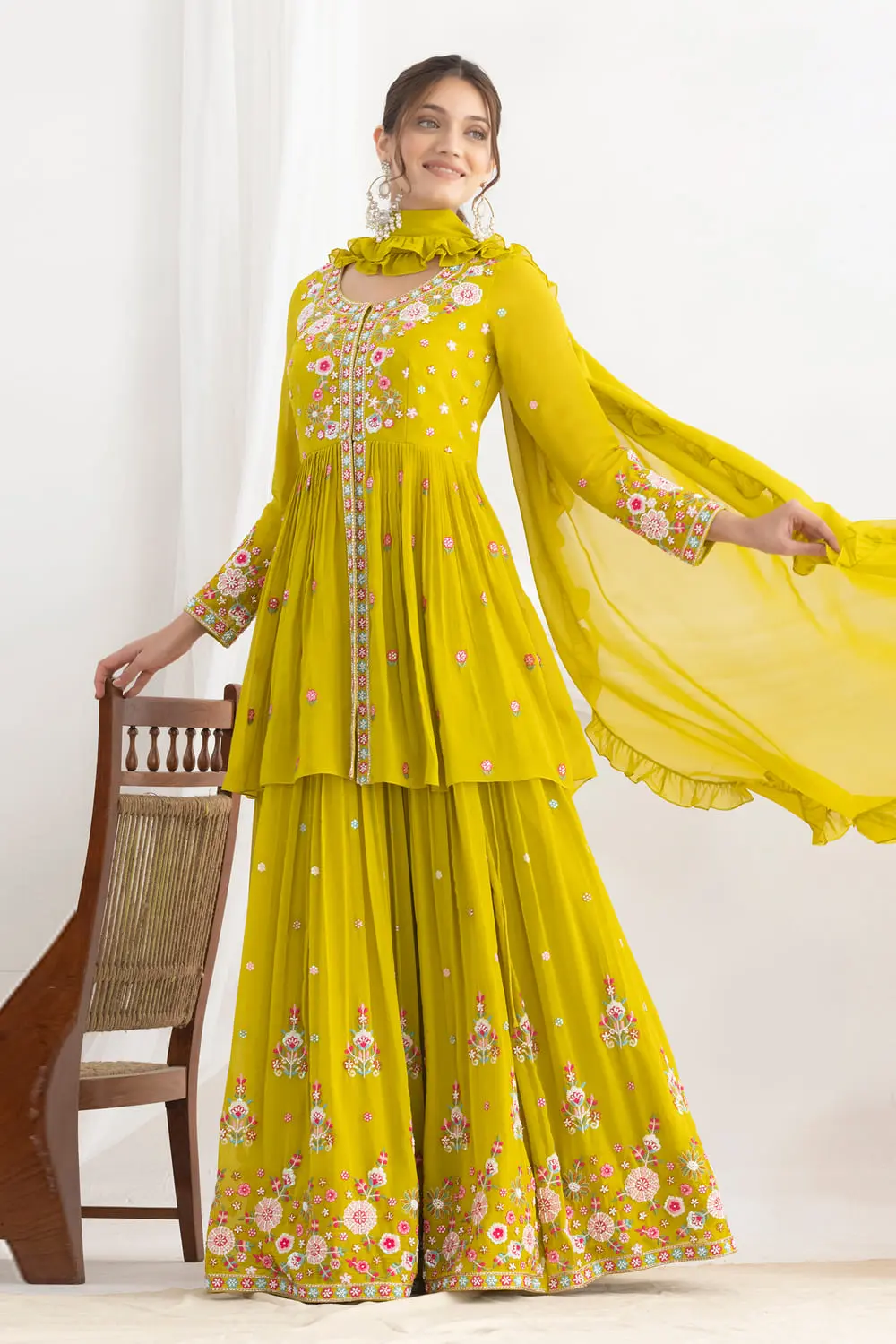 Mustard georgette kurta lehenga styled with four side frill dupatta