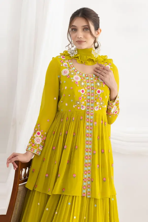 Elegant neckline with floral silk and beadwork on mustard georgette top