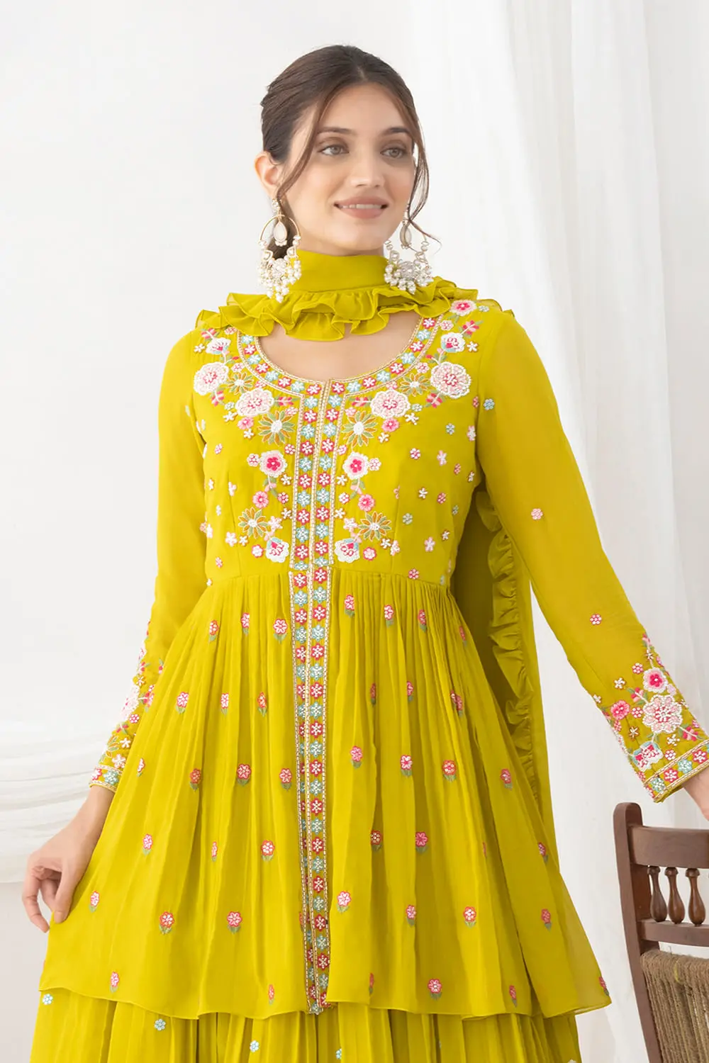Allover pleated mustard lehenga with floral silk and beads work