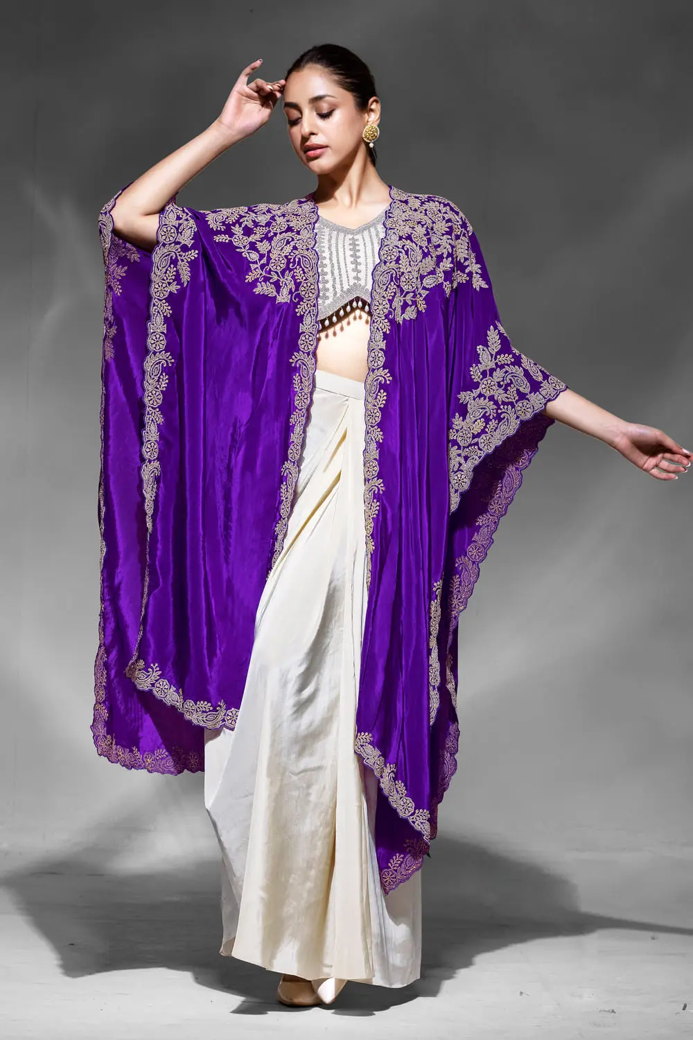 Heavy dabka dori and mirror work blouse with jhumka lace in purple