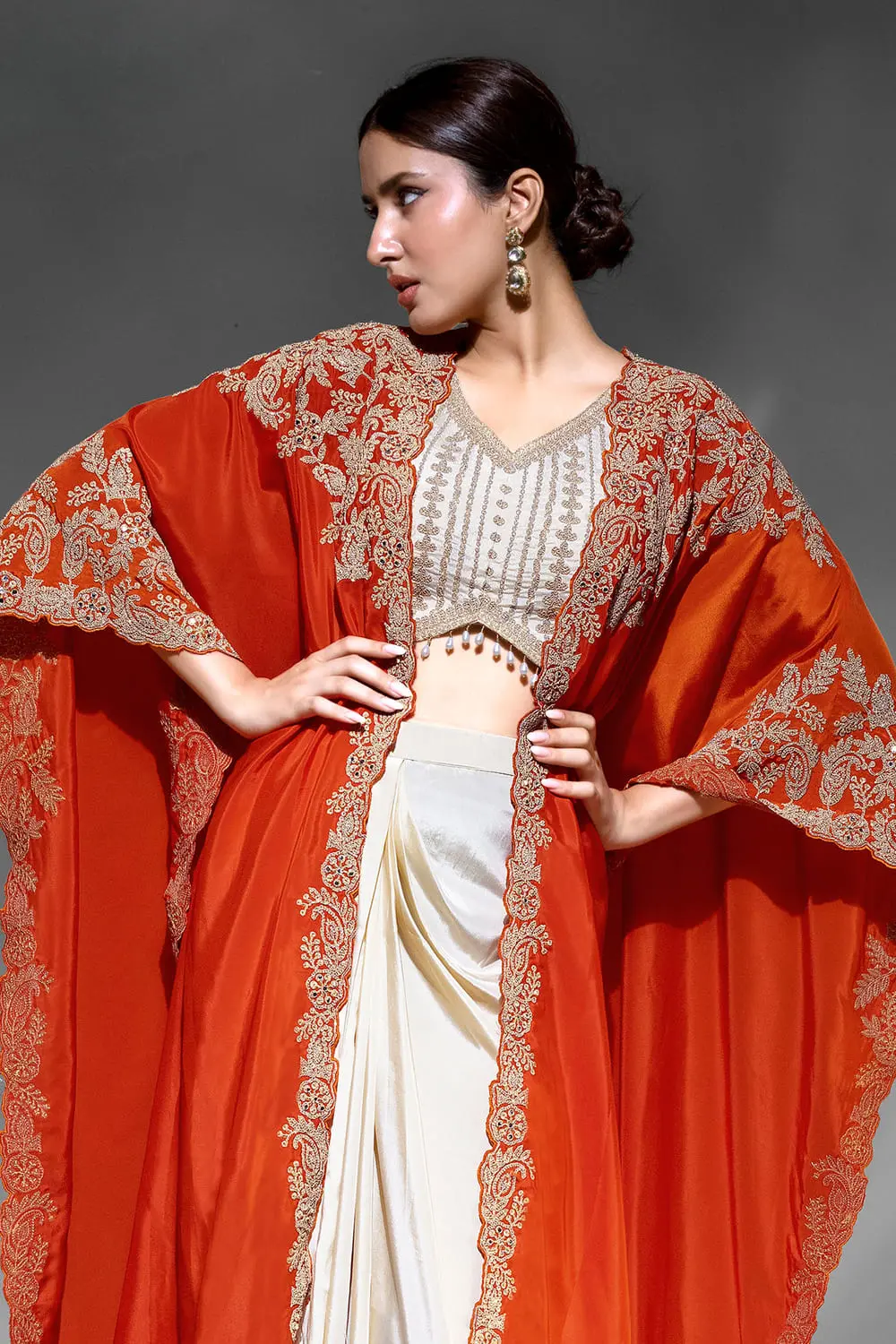Heavy dabka dori and mirror work blouse with jhumka lace in orange