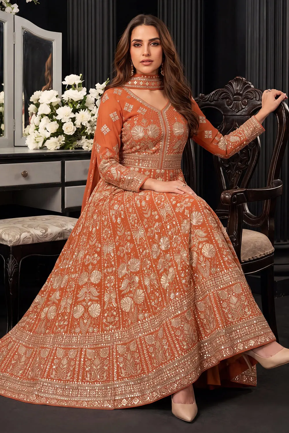 Orange georgette anarkali gown with chinon dupatta seated view