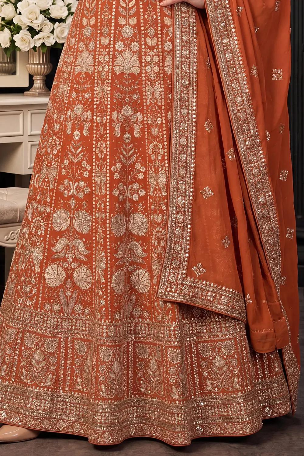 Orange anarkali gown skirt hem with georgette flare and embroidery