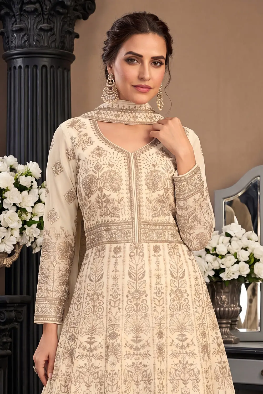 Close up of premium embroidery on beige georgette anarkali gown