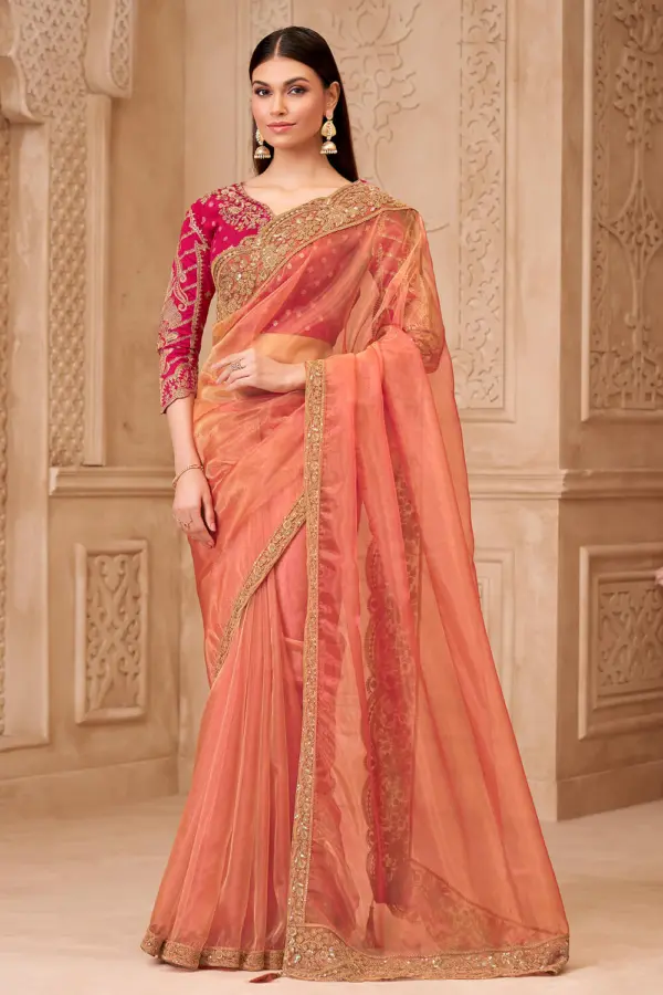 Peach georgette saree for engagement with brocade weaved blouse by Khaish