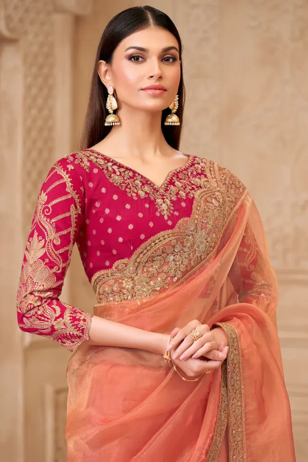 Peach satin georgette saree styled with brocade weaved blouse