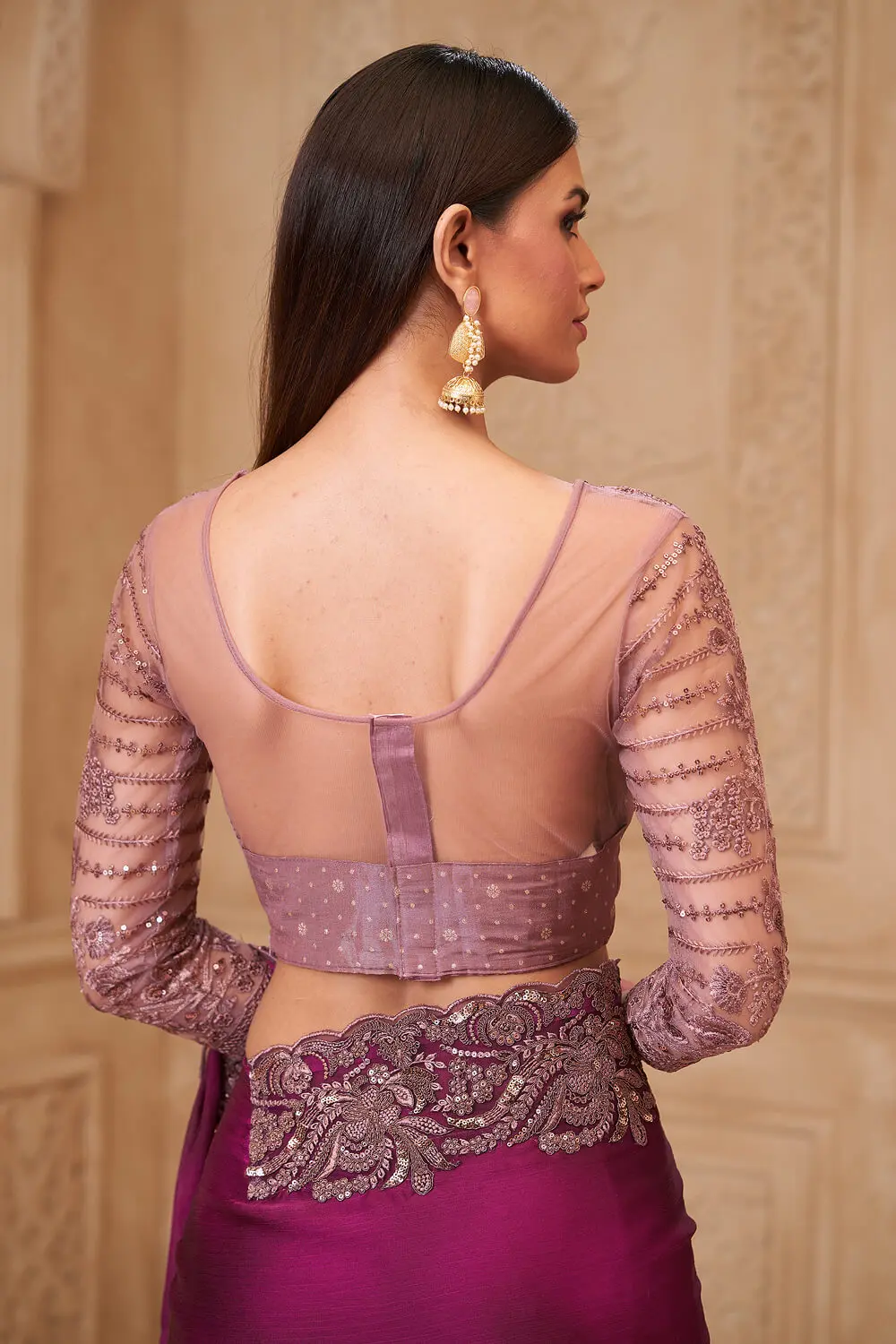 Back pallu view of Wine Satin Georgette Embroidered Saree