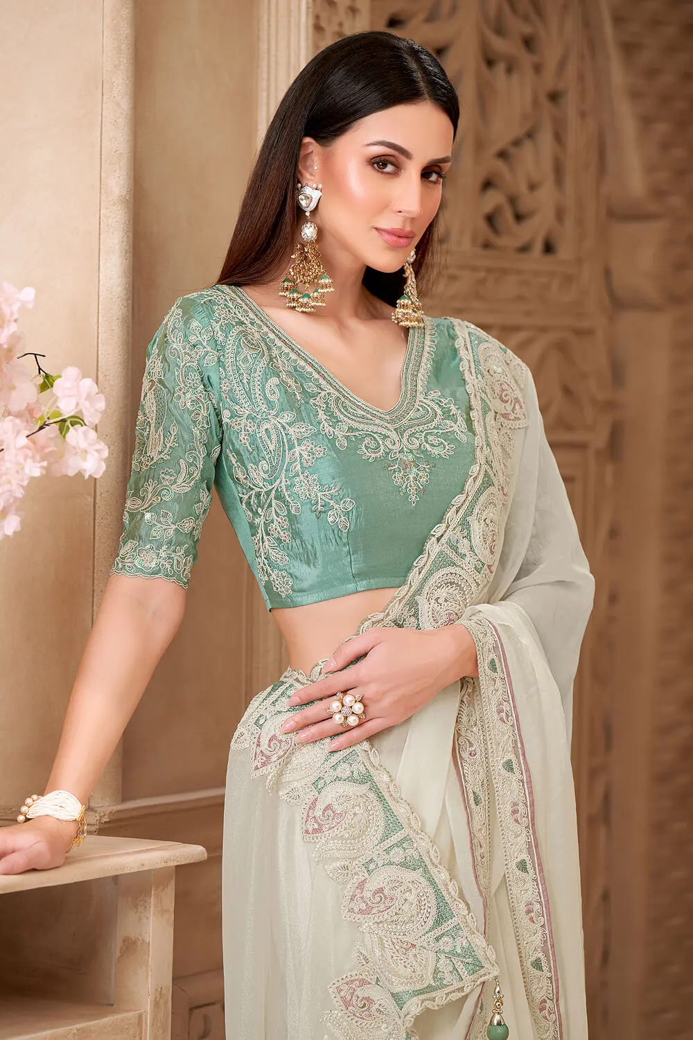 Close‑up of embroidery detail on Powder White Satin Georgette Embroidered Saree