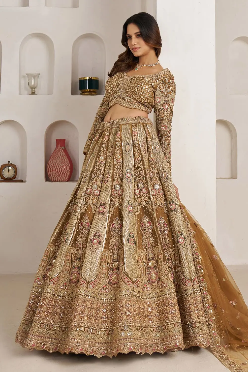 Embroidered full sleeve blouse with beads and stone work in antique gold