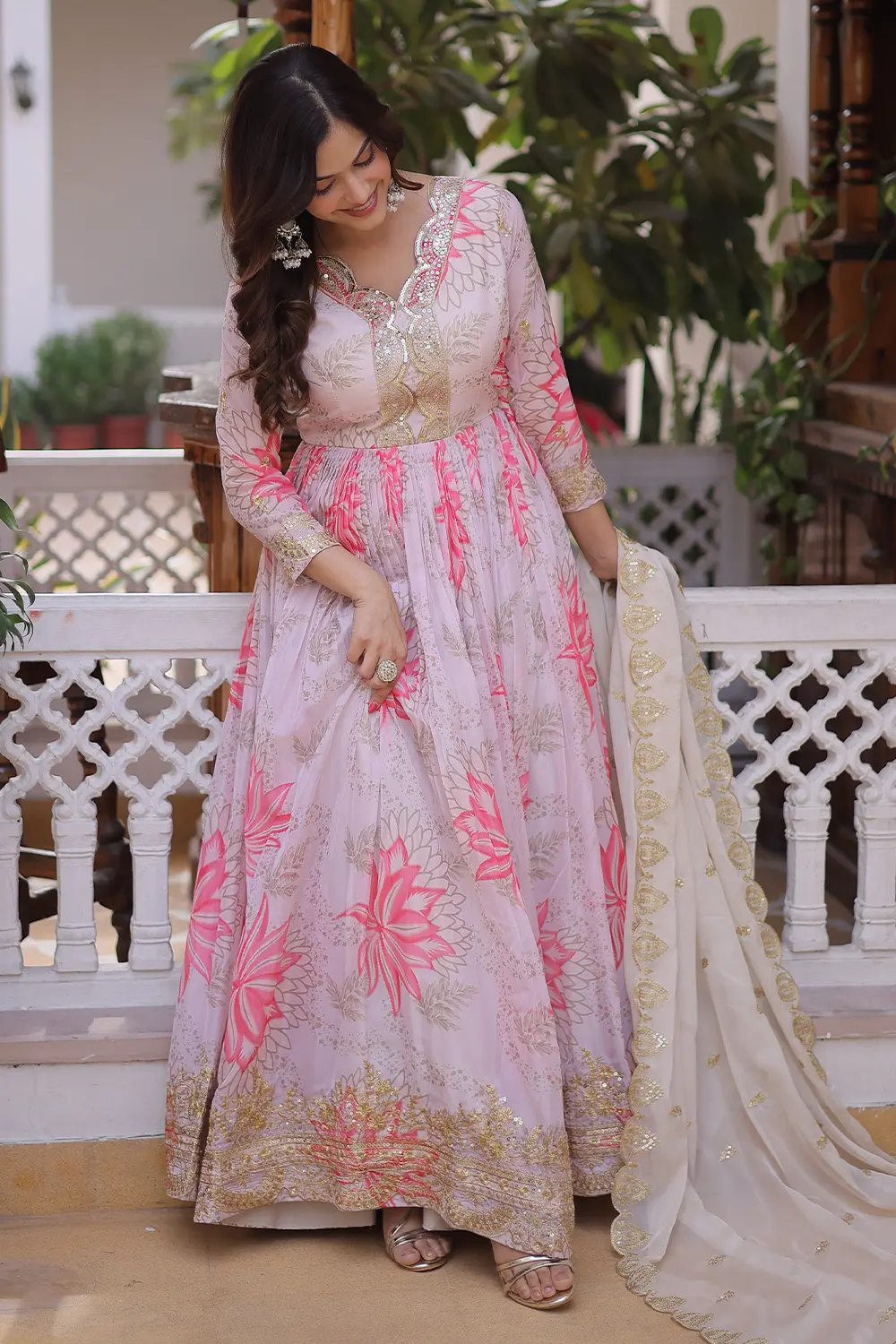 Ivory floral anarkali gown styled with Russian silk cutwork lace dupatta
