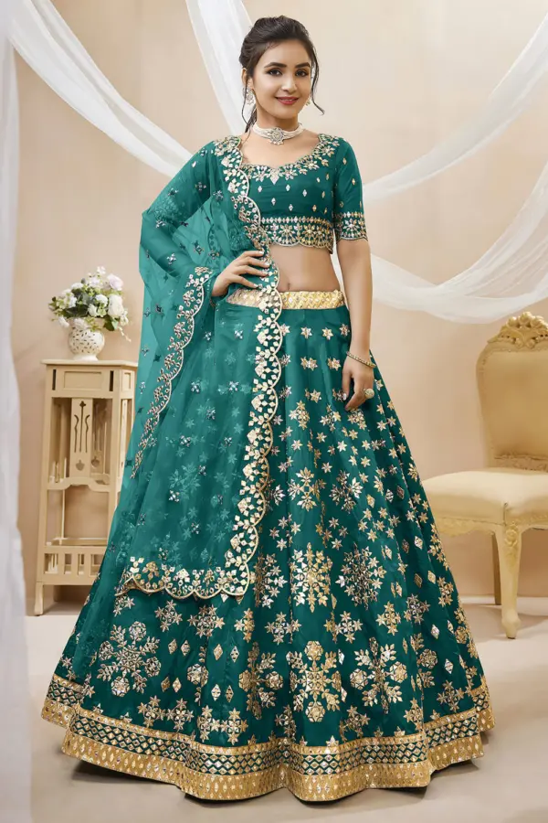 Teal green art silk lehenga for reception with sequins and zari work by Khaish