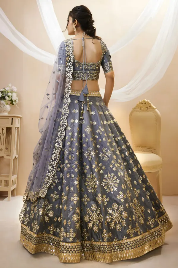 Back view of grey art silk lehenga choli with embroidered blouse