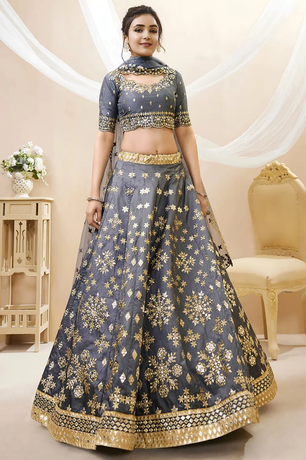 Grey art silk lehenga with foil and zari embroidery and net dupatta
