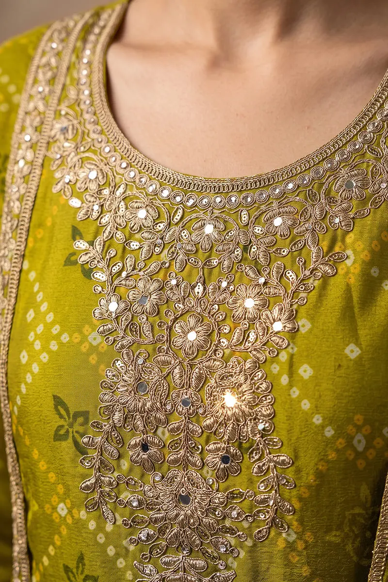 Close up of heavy embroidery and mirror work on two tone green kurta top
